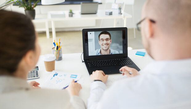 business team having video conference at office