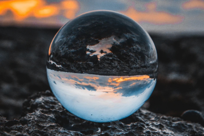 globe-no-hands-cropped-900×444